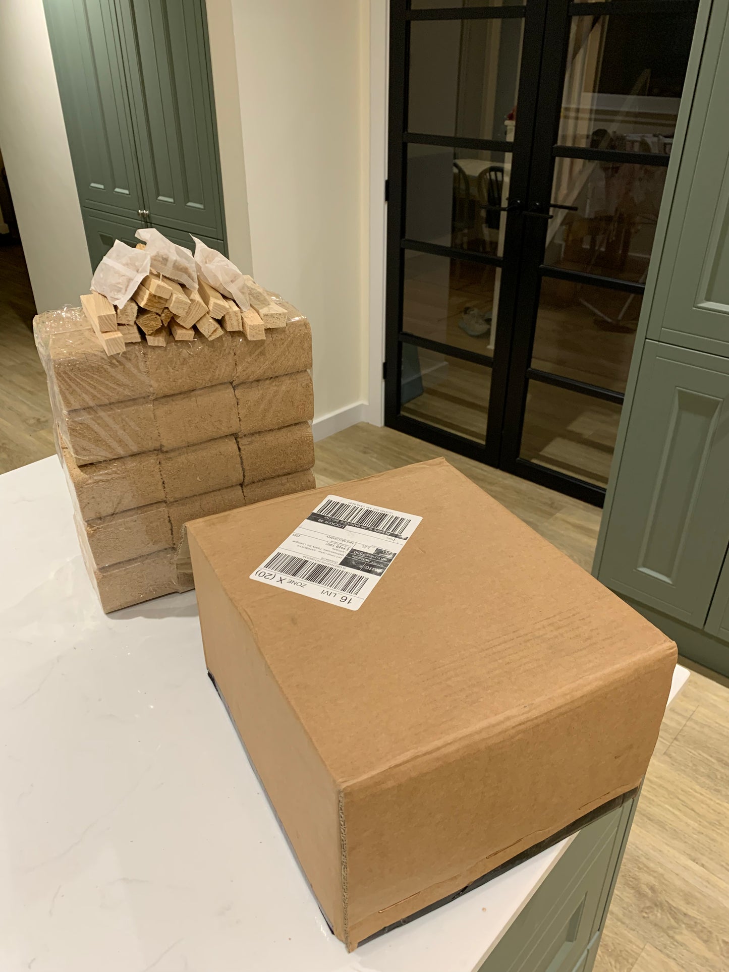15 oak briquettes plus kindling and firelighters. Mail order delivery to home address