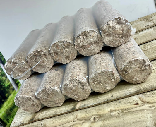 10 packs of compressed sawdust briquettes