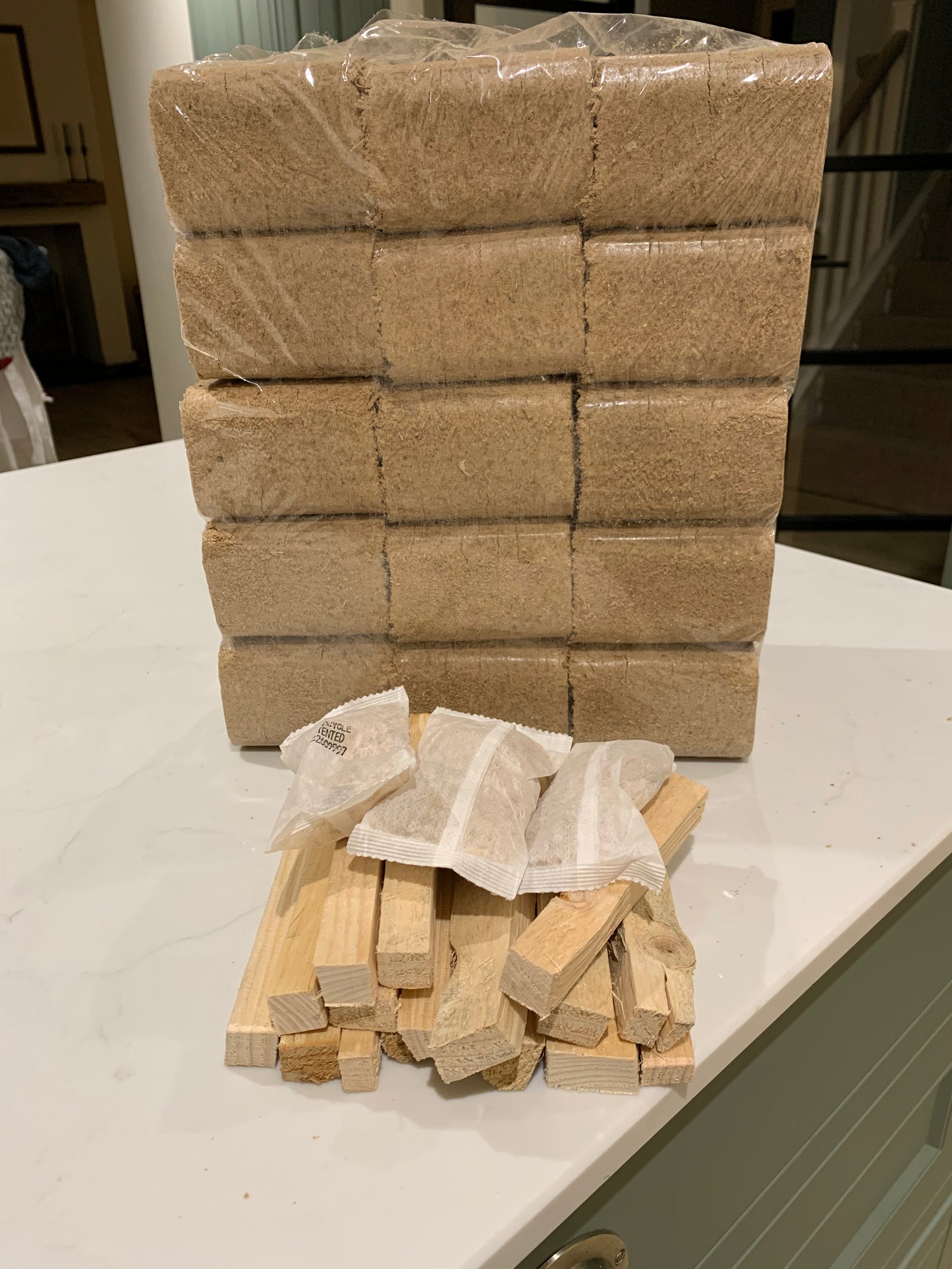 15 oak briquettes plus kindling and firelighters.  Mail order delivery to home address
